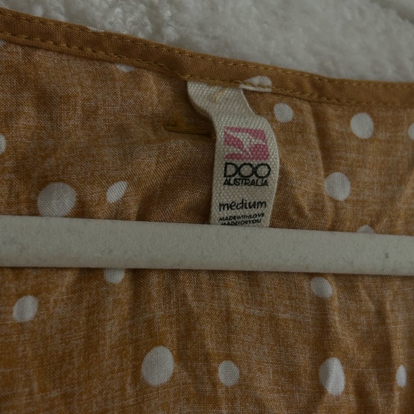 Mini dress, flowy with dotted details and zipper on the side. - Picture 2 of 3